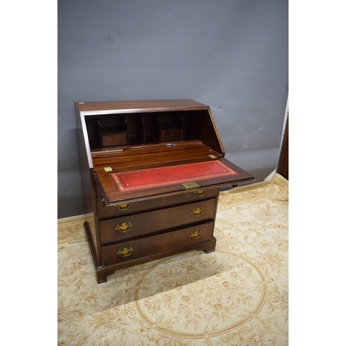 426 - Reproduction bureau with leather insert to top.  See photos.  S2