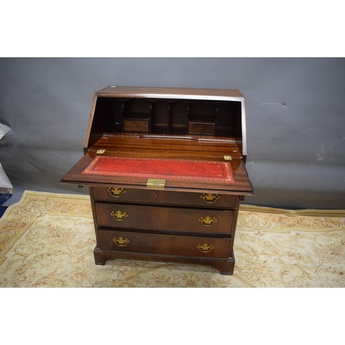 426 - Reproduction bureau with leather insert to top.  See photos.  S2