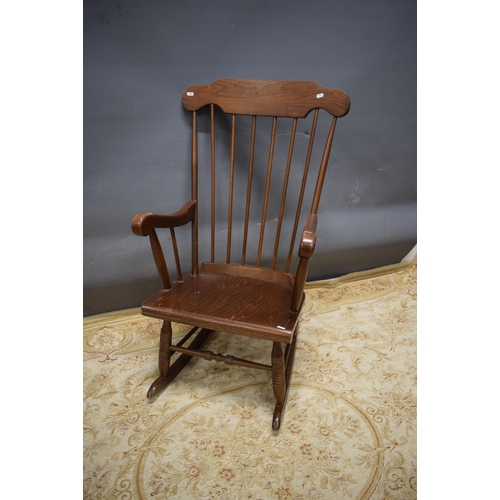 439 - Oak Rocking chair . Some attention needed to one arm. See photos. S2