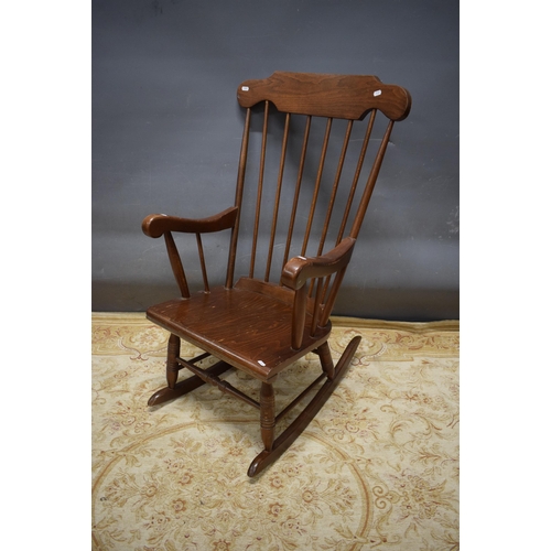 439 - Oak Rocking chair . Some attention needed to one arm. See photos. S2