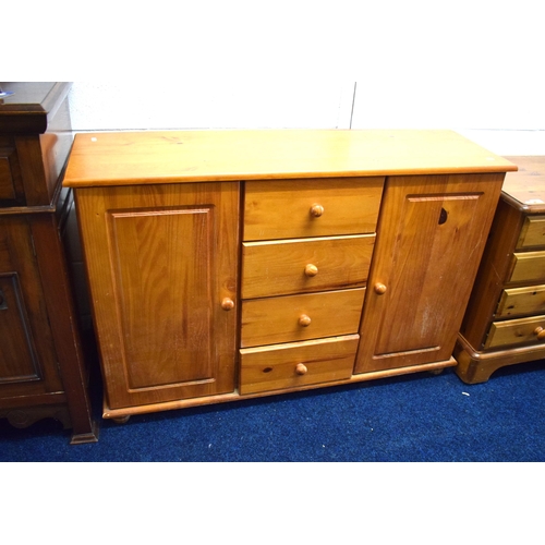 440 - Pine Cupboard with four central drawers plus two side cupboards.  Needs TLC. See photos.   H:32