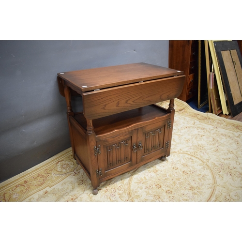 453 - Drop leaf table with handy drawer in the Old charm Style by Mellowcraft. Mounted on castors for easy... 