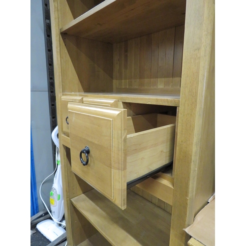 169 - Good quality bookcase with 3 central drawer, 78