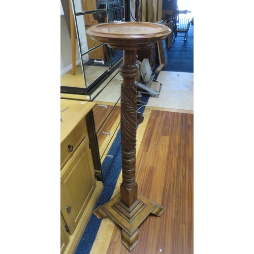 172 - Tall carved oak plant stand, 49.5