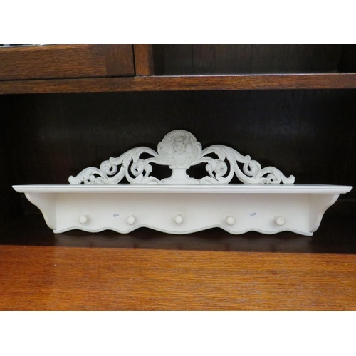 187 - 5 hook decorative wall mounted coat rack.