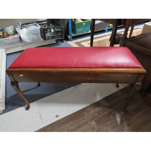 191 - Red leather topped piano stool. 36.5