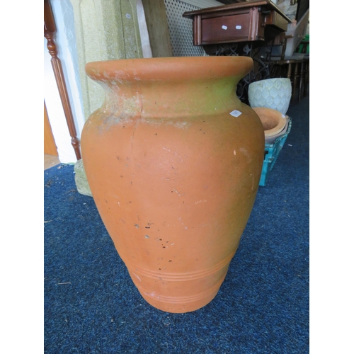 447 - Large terracotta vase/ planter 19