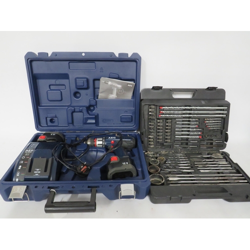 509 - Aeg rechargeable screwdriver plus a drill bit set.