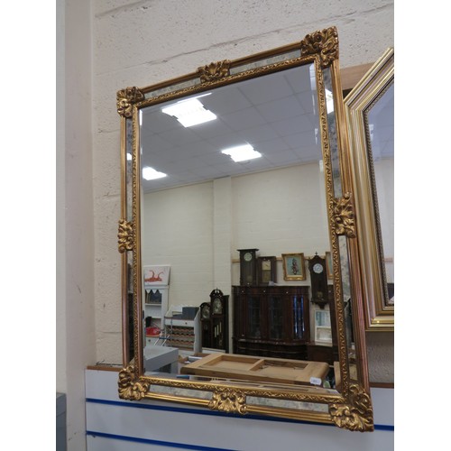 399 - Two lovely gilt framed beveled glass mirrors in excellent condition.  Largest 39 x 29 inches.