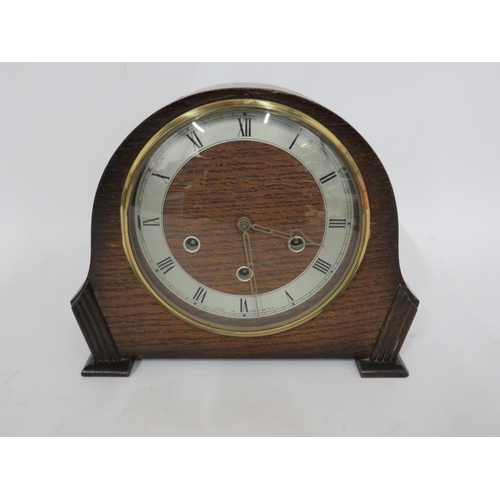 234 - Mid 20th Century Smiths Mantle clock with Oak case. Running order with key and pendulum.