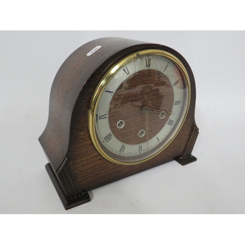 234 - Mid 20th Century Smiths Mantle clock with Oak case. Running order with key and pendulum.