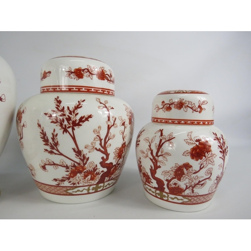 23 - Four pieces of Coalport Indian tree coral, Two lidded jars and two ginger jars. The tallest measures... 
