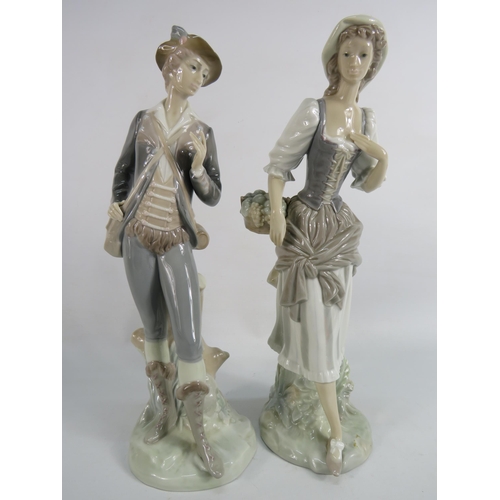 49 - Pair tall Lladro figurine of a Gentleman and a Lady 11.5