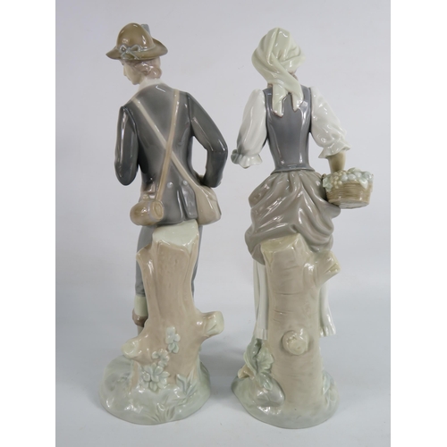 49 - Pair tall Lladro figurine of a Gentleman and a Lady 11.5
