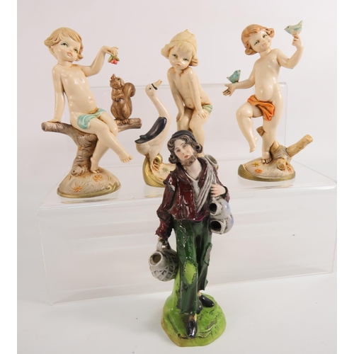 53 - 3 Italian Depose resin figurines plus a Sitzendorf style figurine of a tramp.