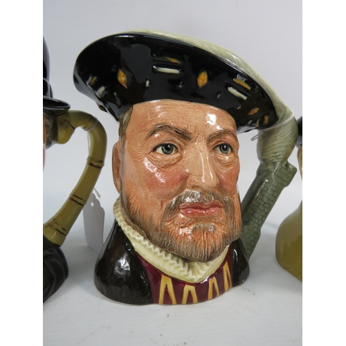 105 - Three Royal Doulton Toby Jugs Charlie Chaplin, Henry VIII & Monty.