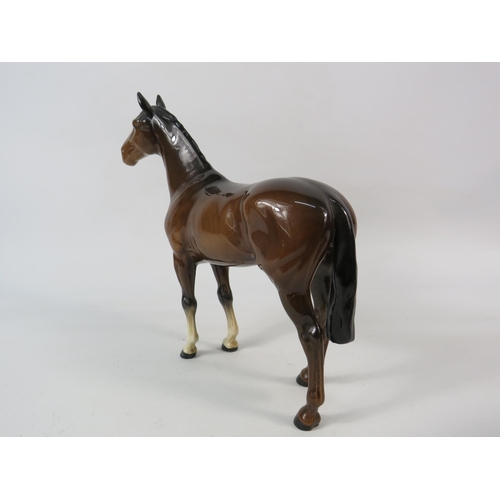 58 - Beswick Spirit of Affection mare and foal figurine on a wooden plinth plus The Winner model no 2412.