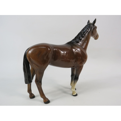 58 - Beswick Spirit of Affection mare and foal figurine on a wooden plinth plus The Winner model no 2412.