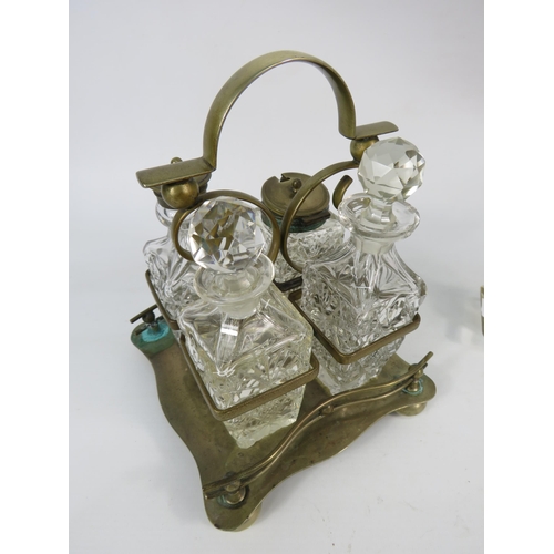 69 - Two Vintage cut glass cruet sets one in a silver plated stand.