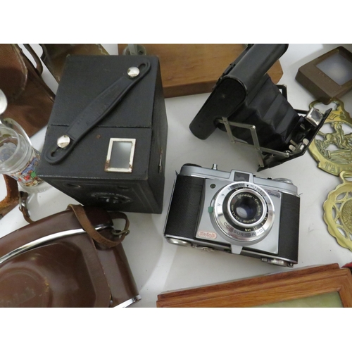 107 - Mixed lot to include interesting wooden boxes, Horse Brasses, Old Cameras etc. see photos.