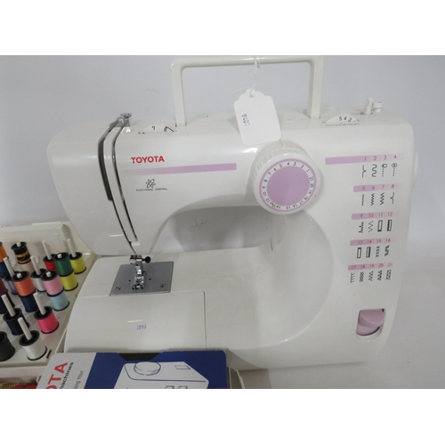 120 - Toyota Electric Sewing machine in running order along with a folding bobin case. Comes with Manual. ... 