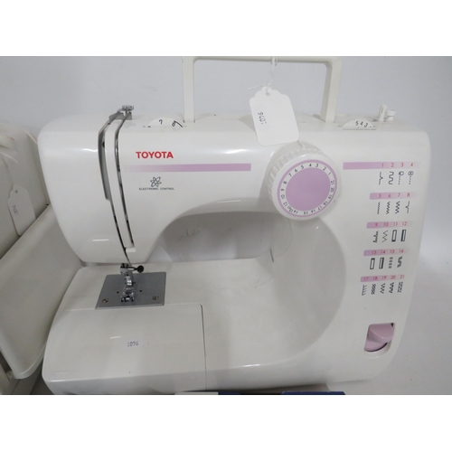 120 - Toyota Electric Sewing machine in running order along with a folding bobin case. Comes with Manual. ... 