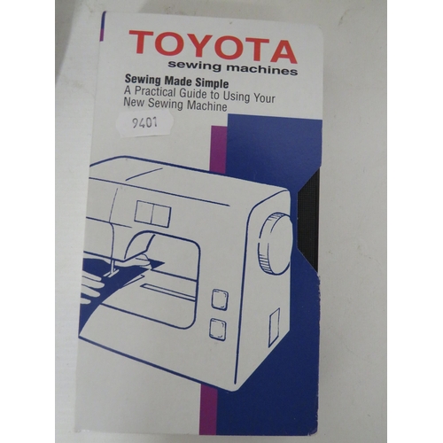 120 - Toyota Electric Sewing machine in running order along with a folding bobin case. Comes with Manual. ... 