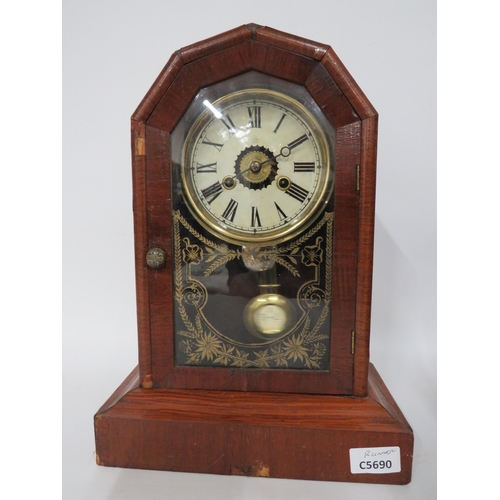 57 - Vintage Mantle Clock in Running order. Approx 14 inches tall.