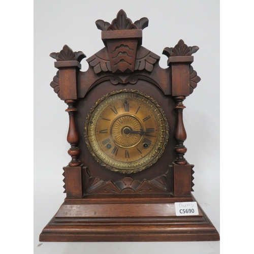 58 - Vintage Mantle Clock in Running order. Approx 14 inches tall.