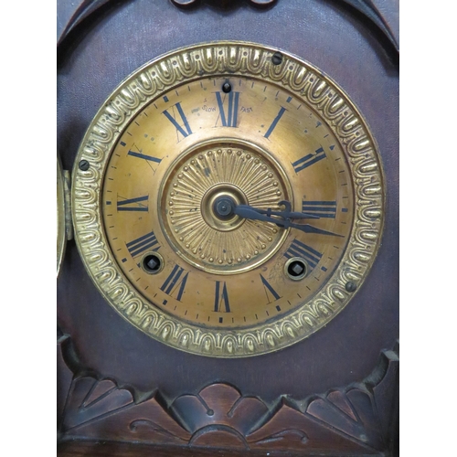 58 - Vintage Mantle Clock in Running order. Approx 14 inches tall.