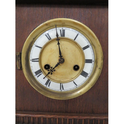 59 - Vintage Mantle Clock in Running order. Approx 16 inches tall.