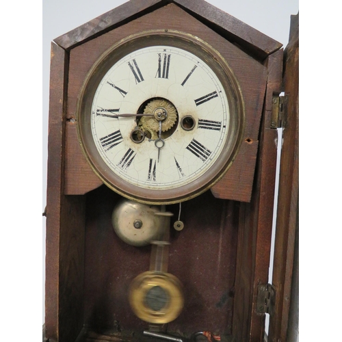 64 - Vintage Mantle clock in running order with key. Approx 14 inches tall.