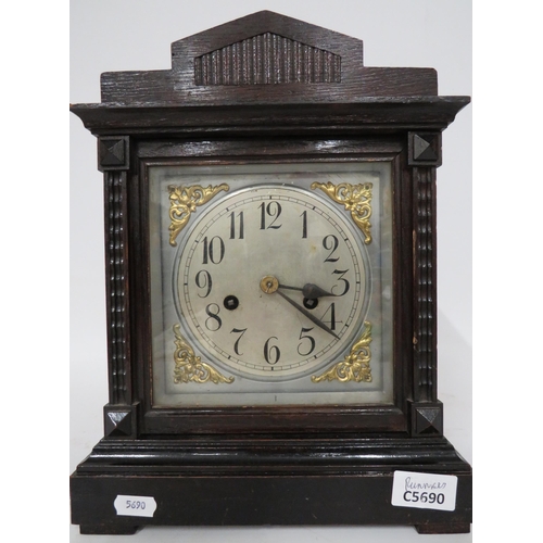 66 - Vintage Mantle Clock in running order but no Key. Approx 13 inches tall.