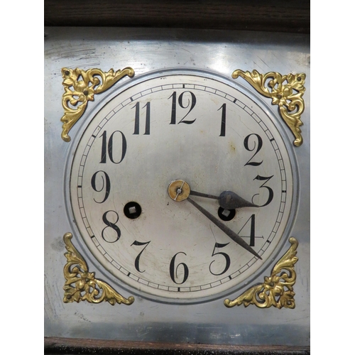 66 - Vintage Mantle Clock in running order but no Key. Approx 13 inches tall.