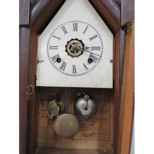 68 - Vintage Clock in running order with key, one finial missing.