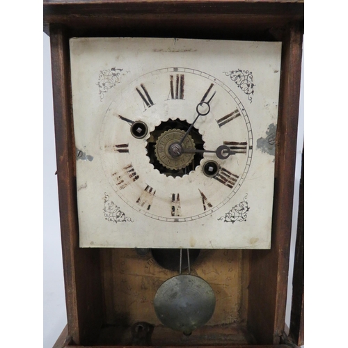 70 - Vintage Mantle Clock with key . Approx 11 inches tall.