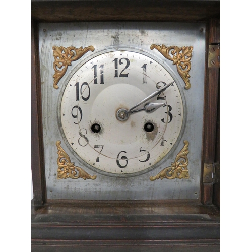 71 - Vintage Mantle Clock in running order but no Key. Approx 13 inches tall.