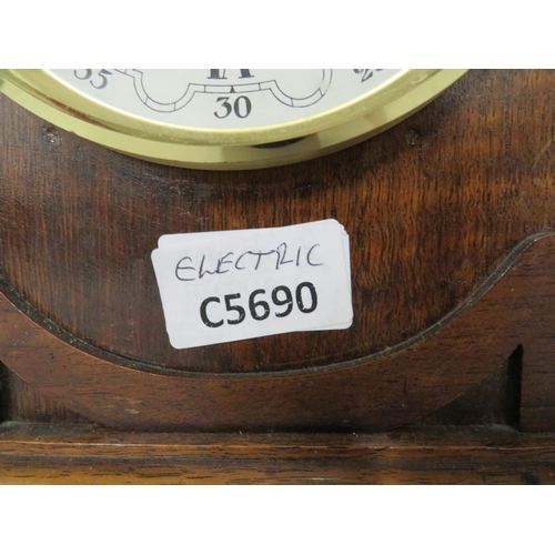 79 - Two Vintage Oak Cased Mantle Clocks. Both have been converted to Quartz Movement and will need batte... 