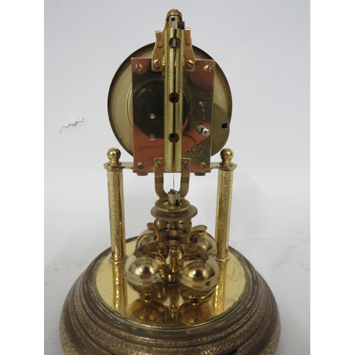 80 - Bentima Anniversary clock with brass body under glass dome. Running order but no Key.  Approx 8 inch... 