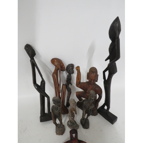 89 - Selection of Carved African figures plus tribal mask which is 10 inches long.