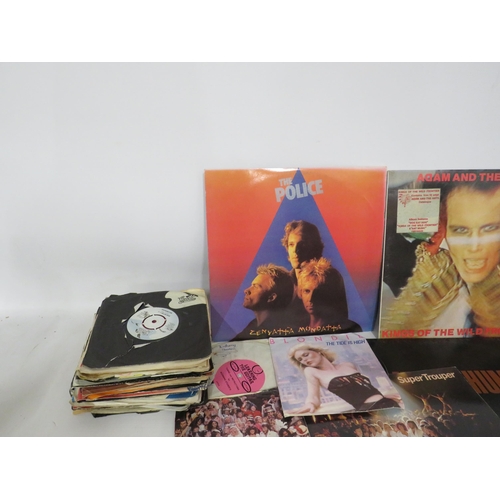 151 - Eight Vinyl Lps and a selection of 45s. The Police, Abba, U2 etc.