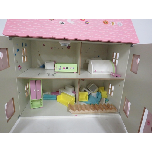 185 - Dolls house with dolls furniture. 22