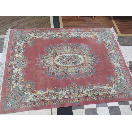 123 - Large Woollen Chinese style rug in very good condition. Measures 2.7 x 3.6 Meters. See photos.