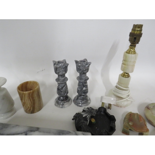 211 - Selection of various Onyx marble items including eggs, candlesticks etc.