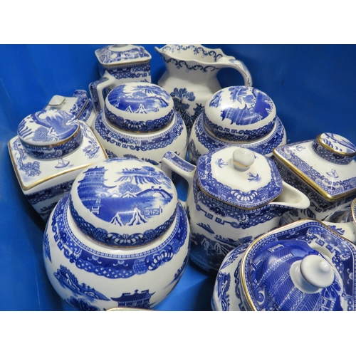 213 - 2 boxes of blue and white ceramics in the willow pattern, Ringtons etc.