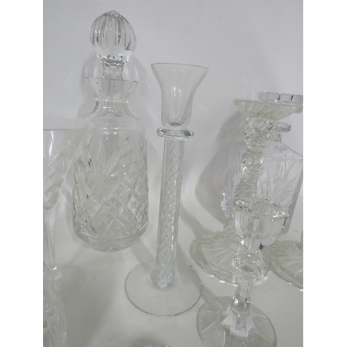 224 - 2 Crystal glass decanters, 6 champagne glasses and various candlesticks etc.