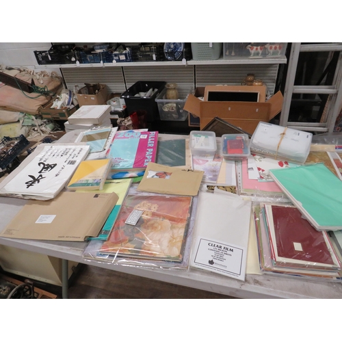 245 - Large selection of crafting paper and card making supplies.