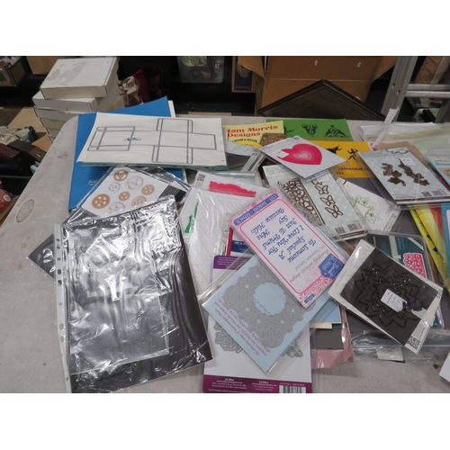 246 - Large selection of crafting paper and card making supplies including cutting dyes.