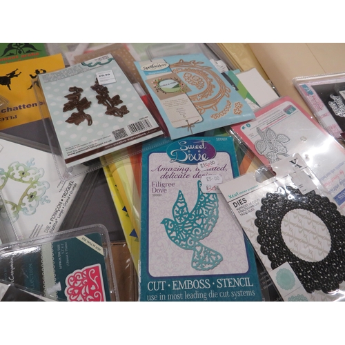 246 - Large selection of crafting paper and card making supplies including cutting dyes.