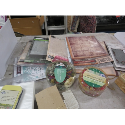 250 - Large selection of crafting paper and equipment.